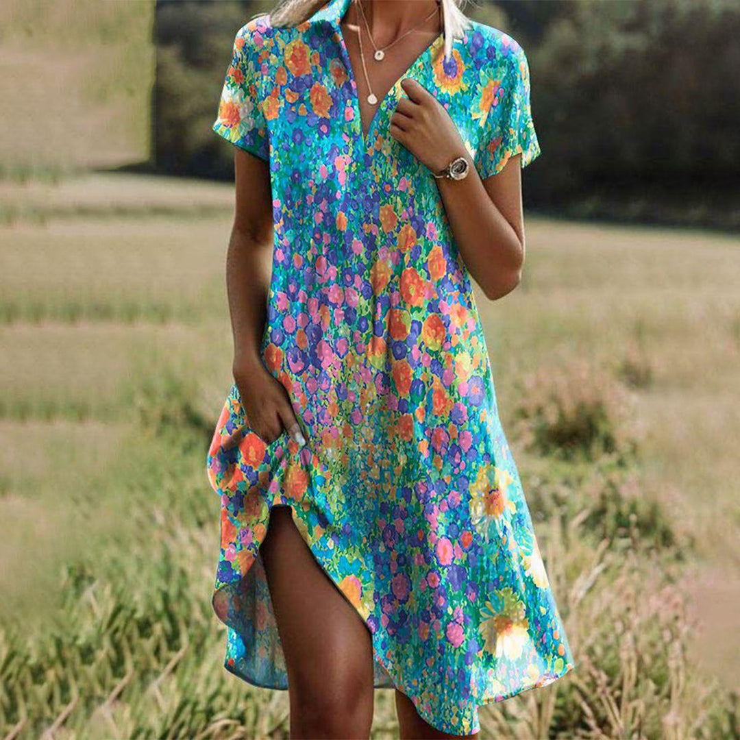 Women's boho floral summer maxi dress with flowy tiered skirt, perfect for elegant casual wear or vacation.