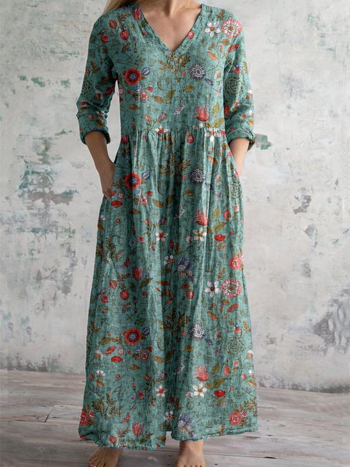 Women's boho floral V-neck maxi dress with convenient pockets, perfect for summer casual wear and flowy comfort.