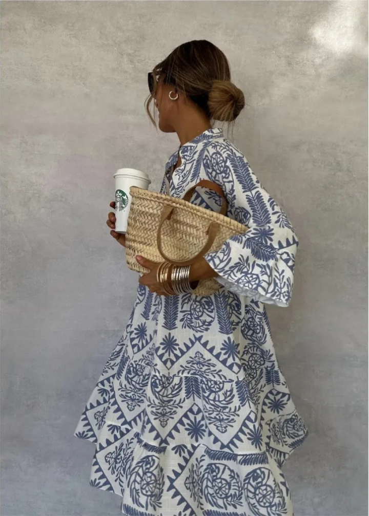 Women's boho print oversized flowy midi dress, perfect for a comfortable & stylish summer look.