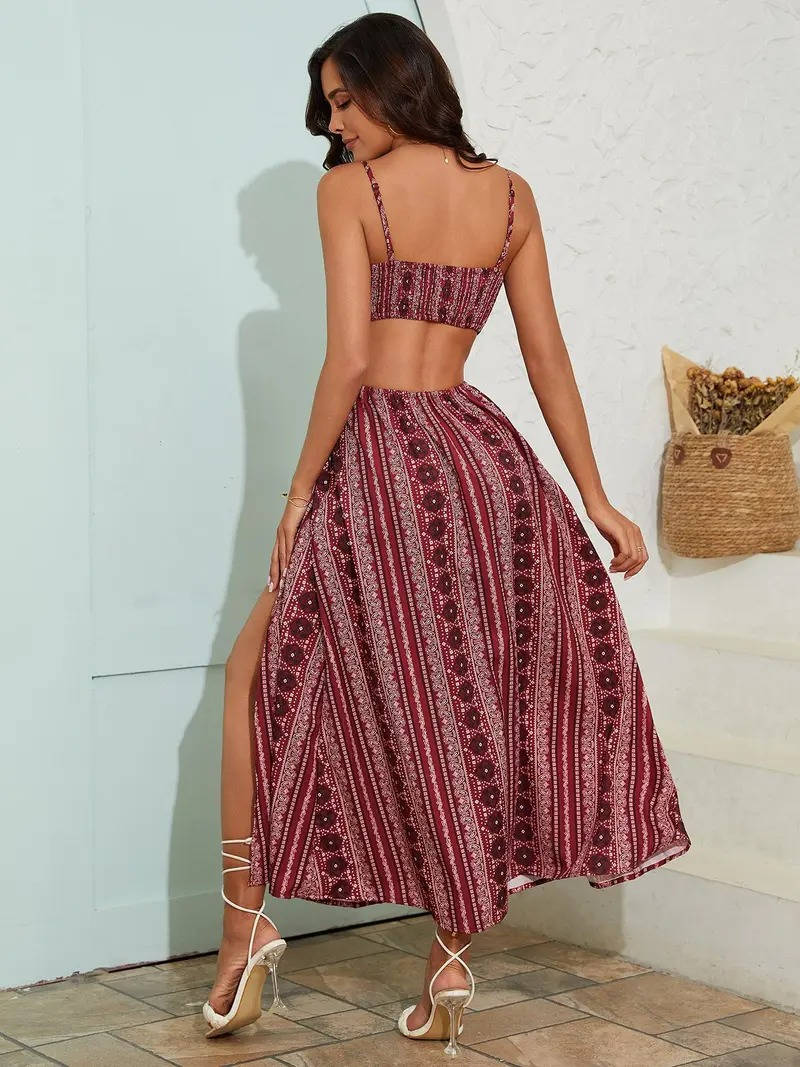 Flowy printed maxi dress for women, perfect as a beach or festival outfit, with smocked back & side slits.