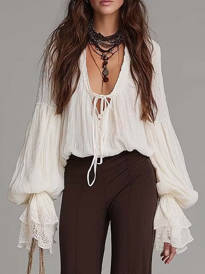 Bohemian matching set for women: flowy wide-leg pants & a stylish lace-up blouse, perfect for summer fashion.