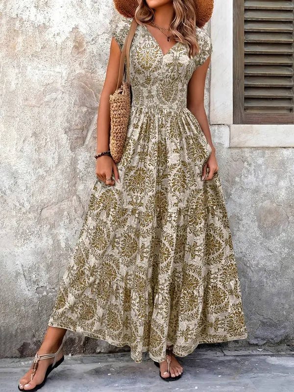 Women's boho V-neck midi dress for effortless elegant style. Versatile summer occasion wear.