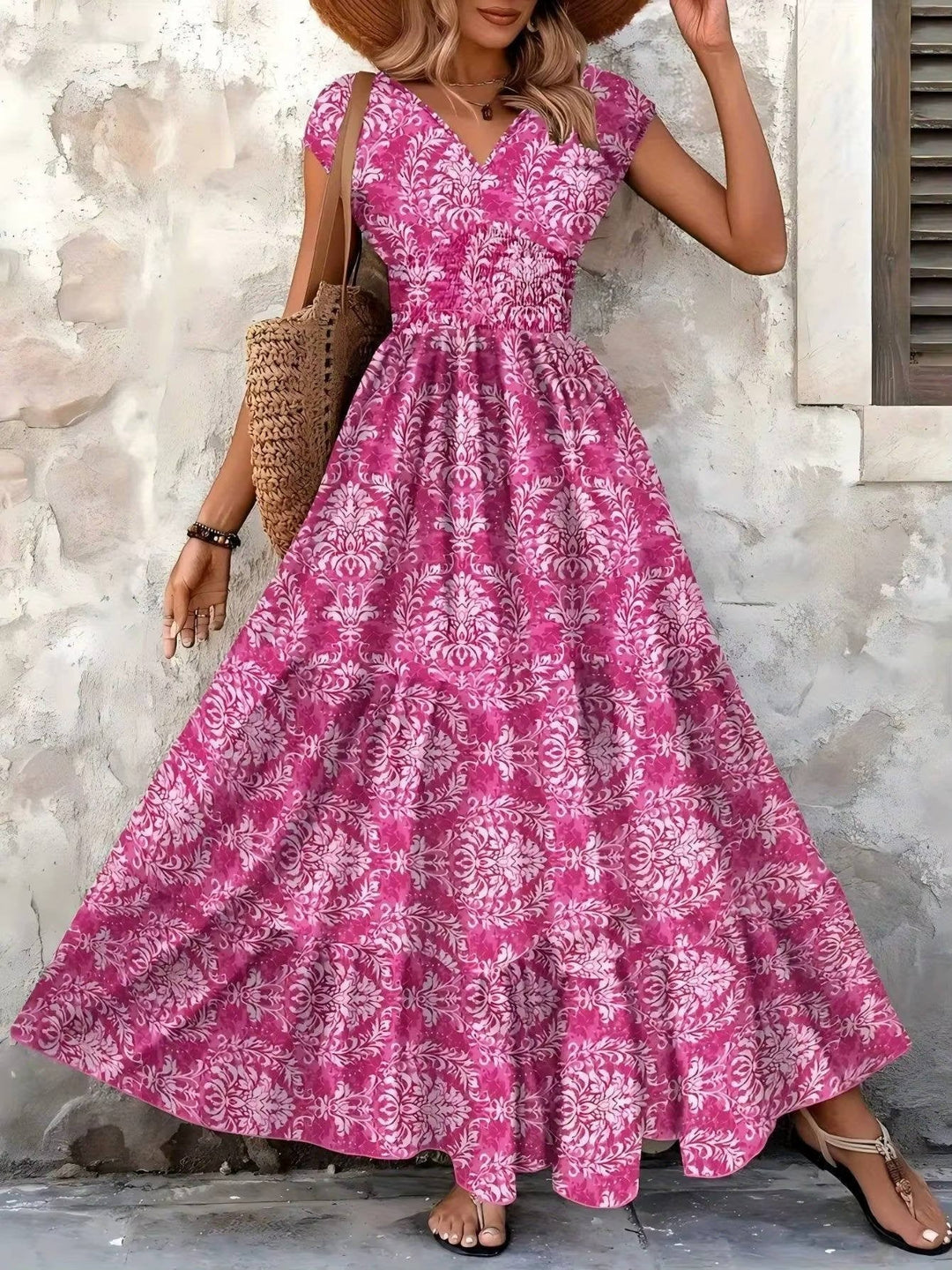 Women's chic boho midi dress with a V-neck, offering effortless style for summer events.