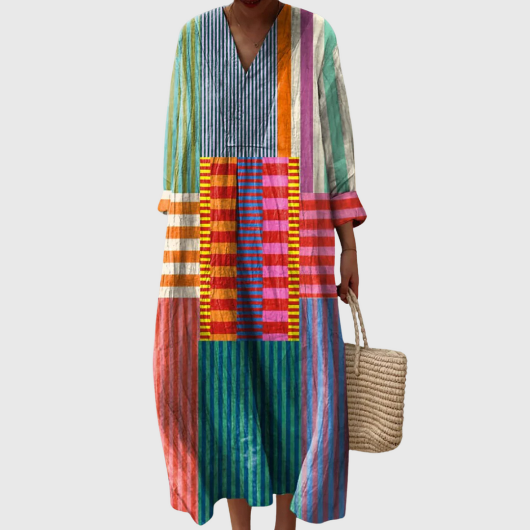 Women's bold multicolor stripe patchwork midi dress with long sleeves, perfect for vibrant, casual style.