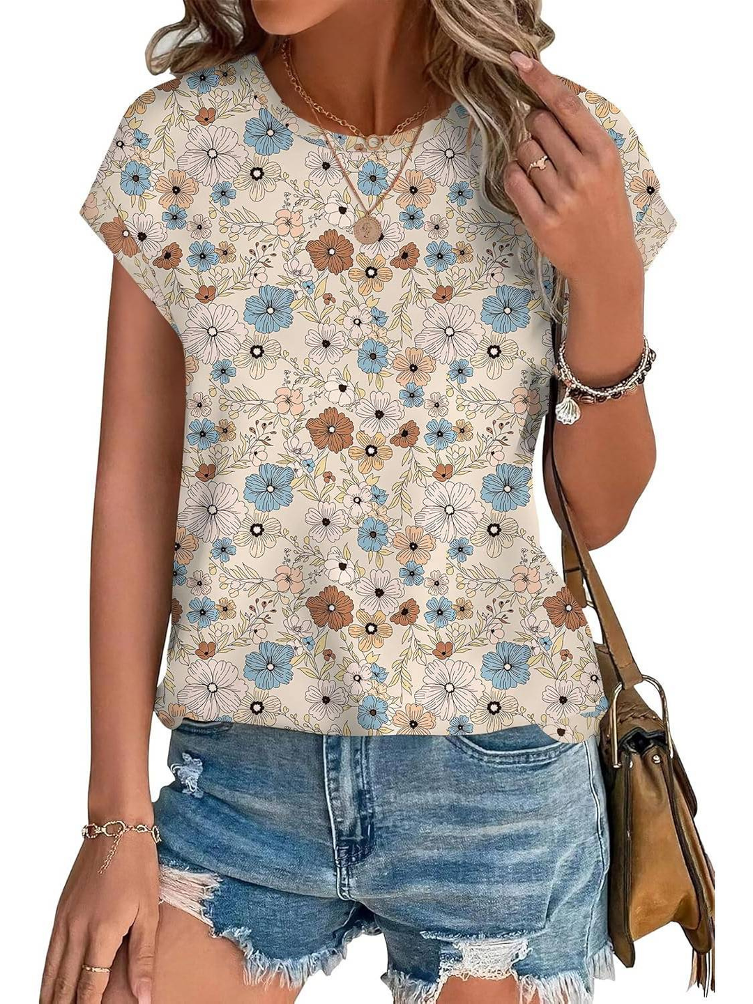 Elegant women's botanical leaf print cap sleeve top. A comfortable and versatile summer essential.
