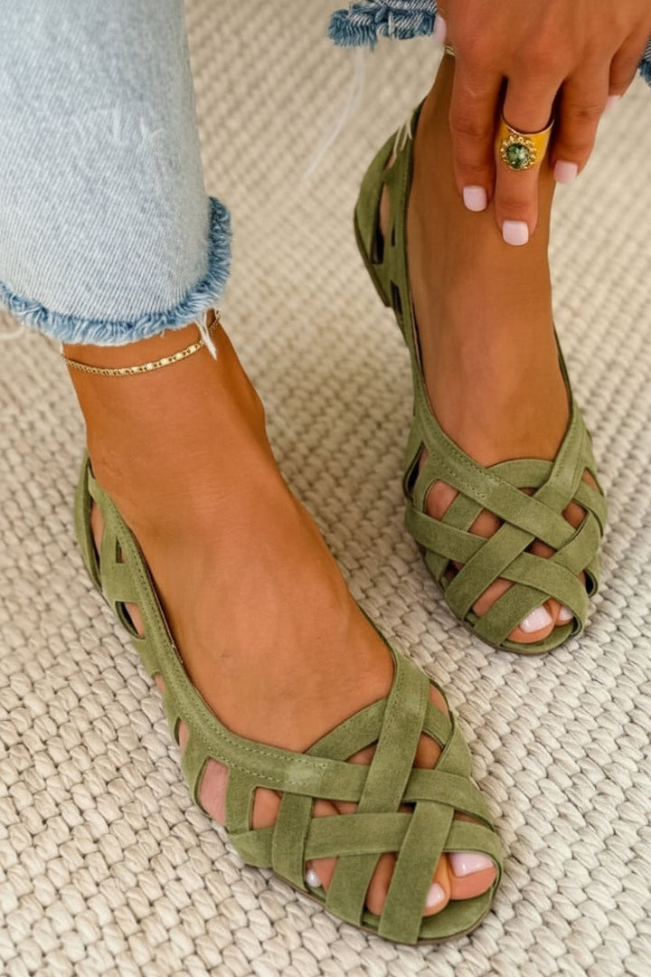 Women's everyday wear sandals with all-day comfort, featuring fashionable braided crossover straps.
