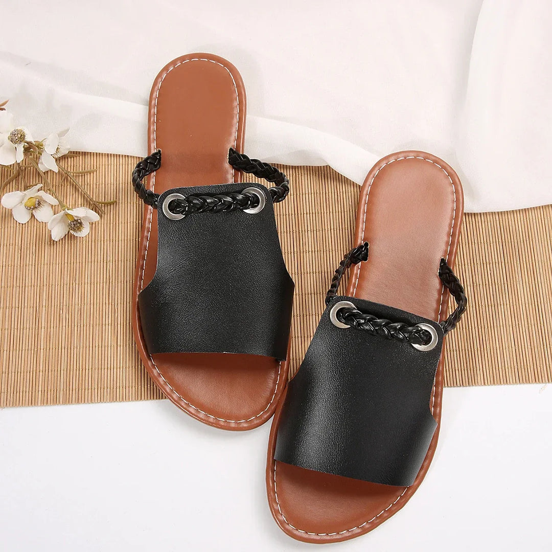 Summer-ready women's slip-on sandals, featuring a chic braided thong design