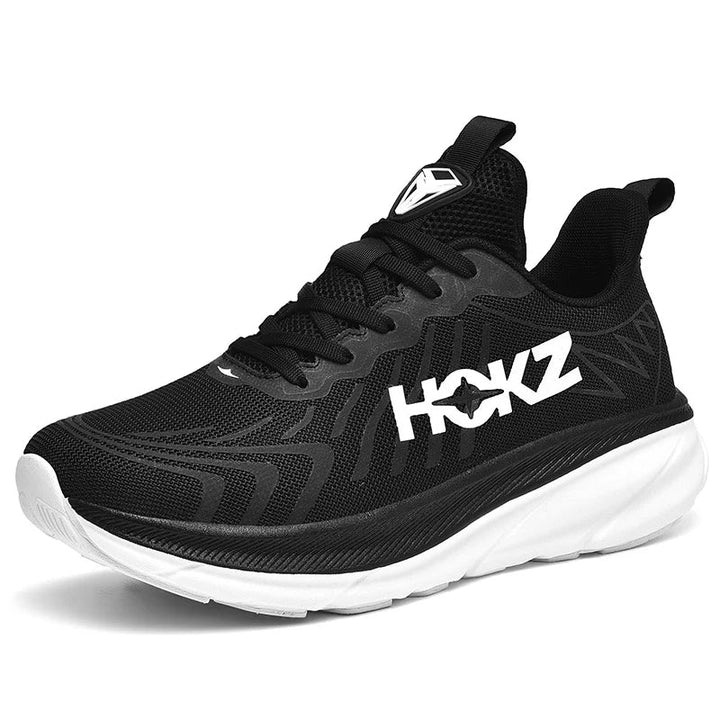Rear view of women's chunky sole running shoes, showcasing support, comfort & modern design.