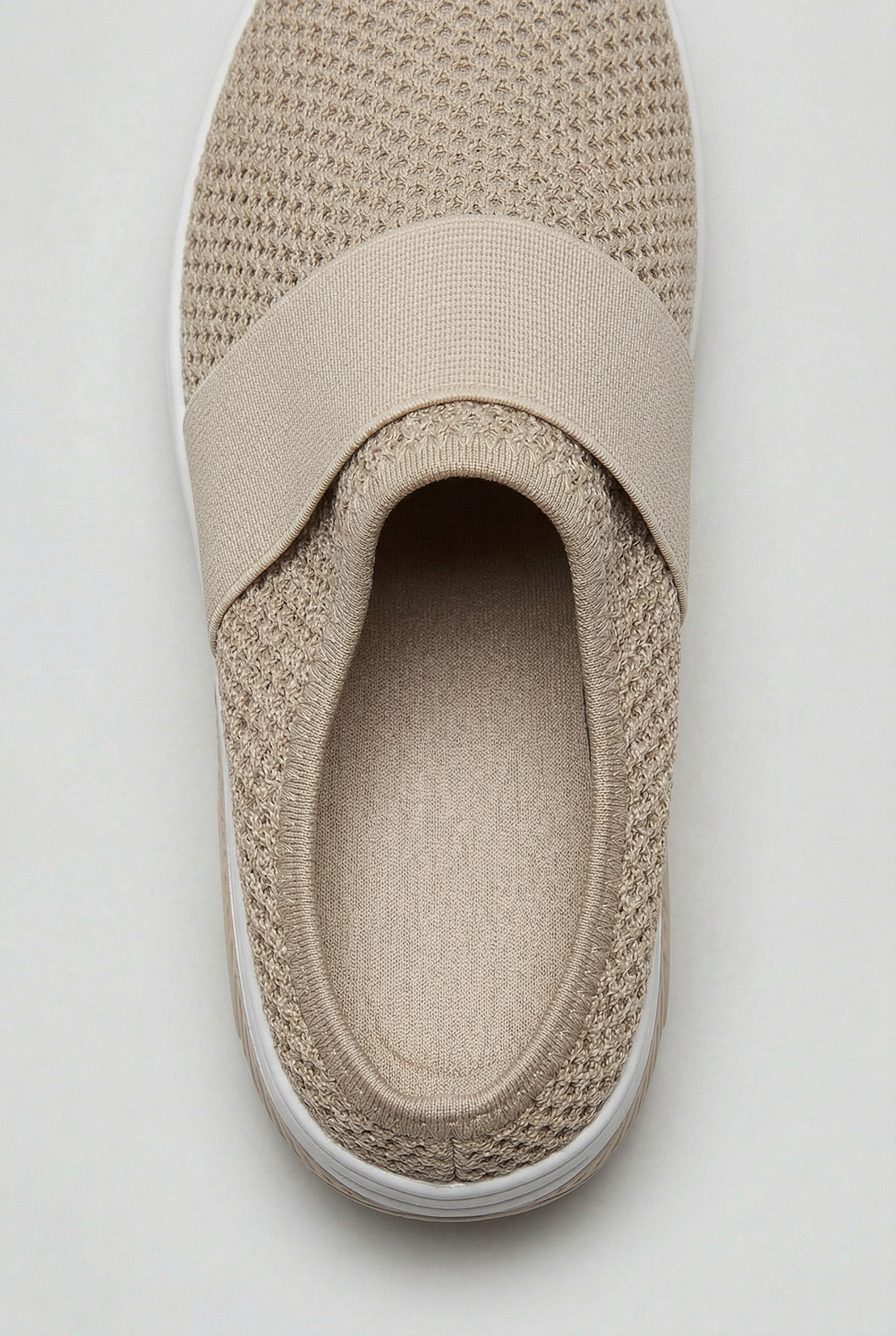 Comfortable women's open-back mules; breathable design, air cushion sole for all-day wear.