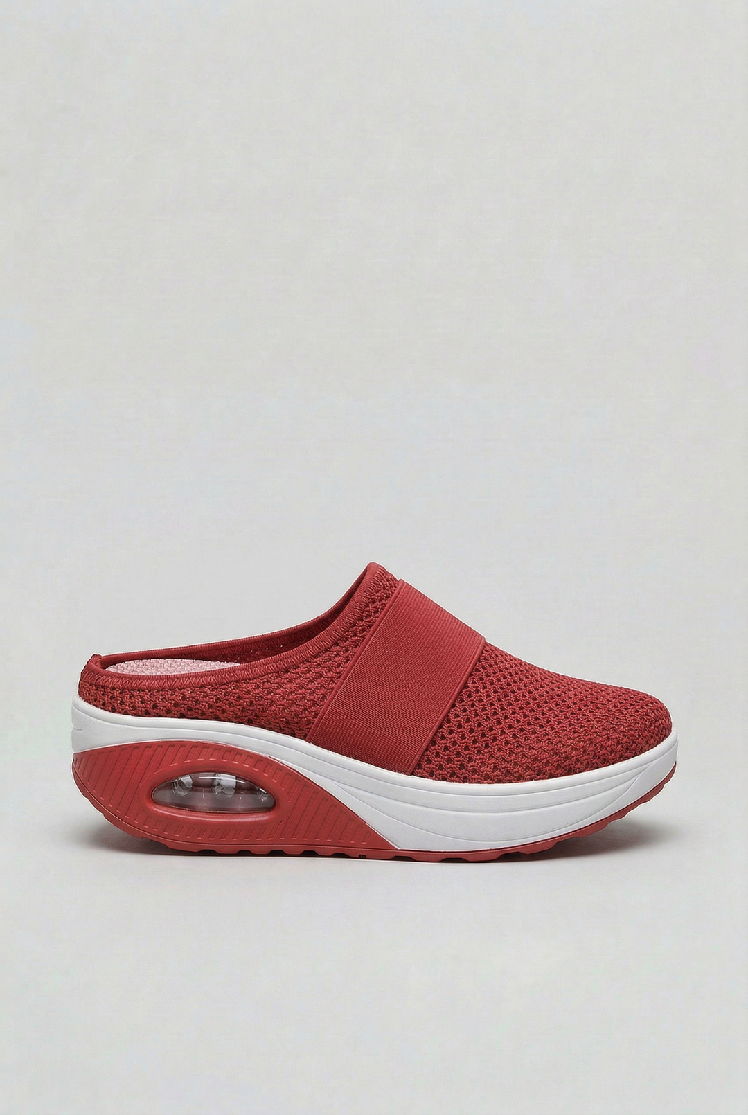 Women's comfort mules, breathable slip-on design with innovative air cushion technology.