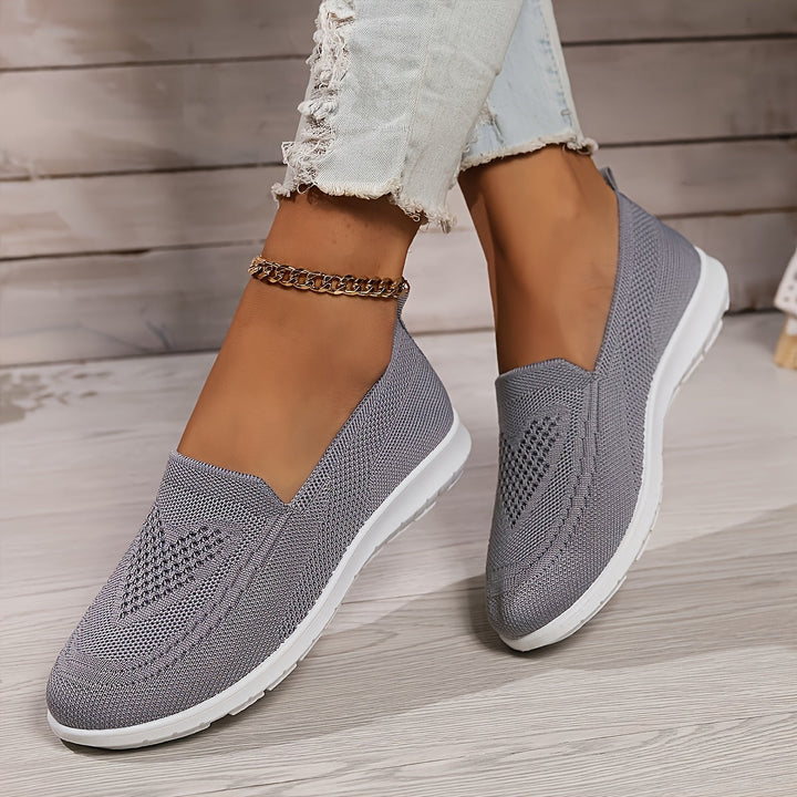 Supportive women's slip-on walking shoes, engineered for comfort & long walks. Casual, athletic & versatile design.