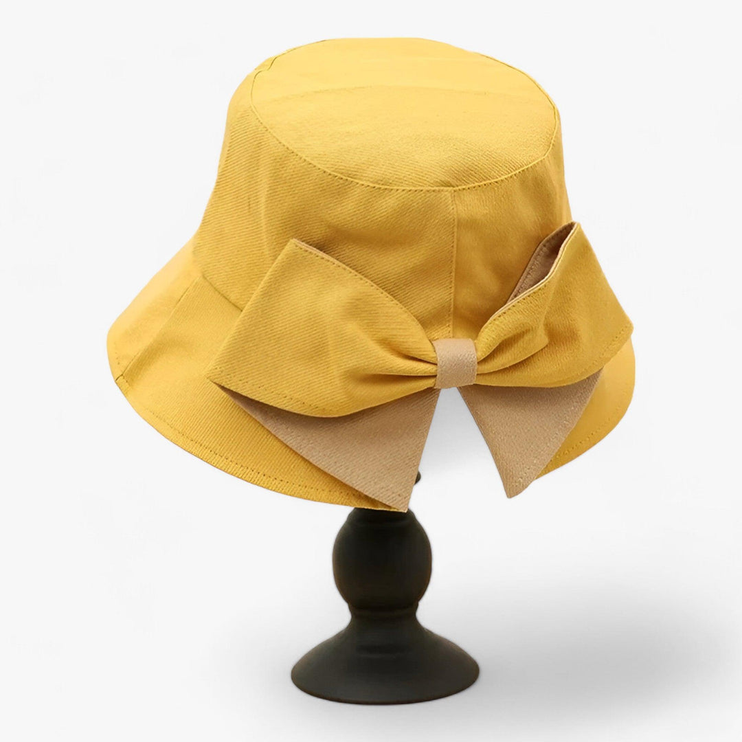 White cotton sun hat for women, breathable and stylish. Ideal for summer, beach, travel, and outdoor casual wear.