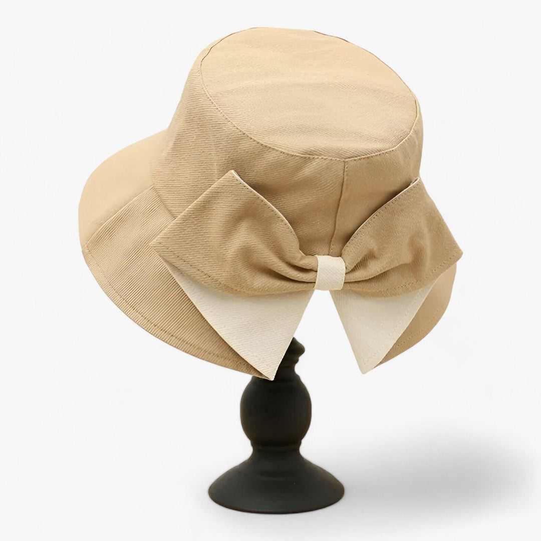 Women's white cotton bucket hat, breathable & comfortable for sun protection. Great for summer, outdoor, and travel.
