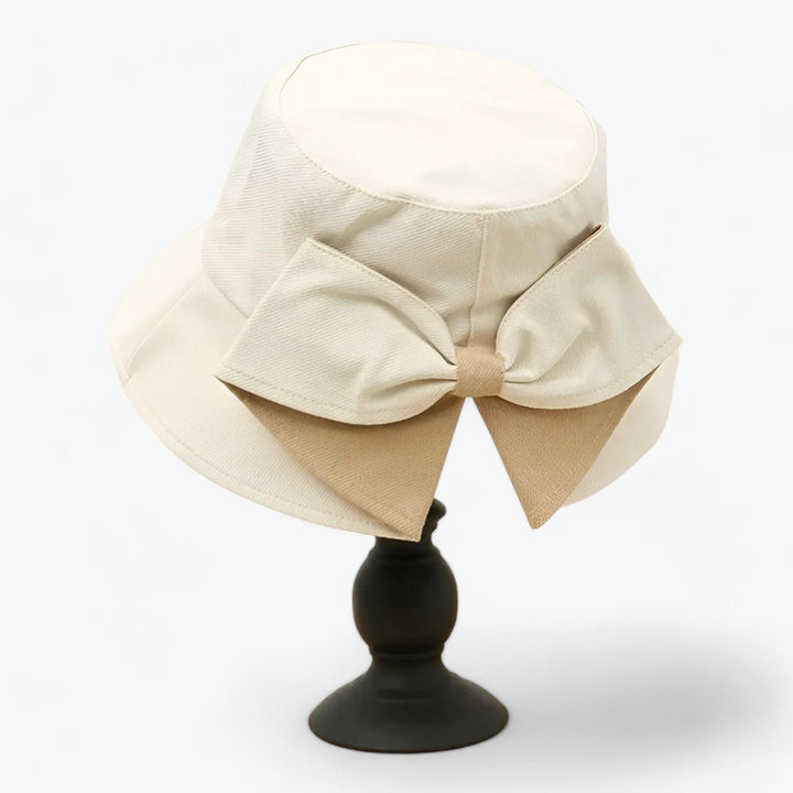 Comfortable women's white cotton sun hat, breathable for all outdoor activities. Versatile summer, beach & travel hat.