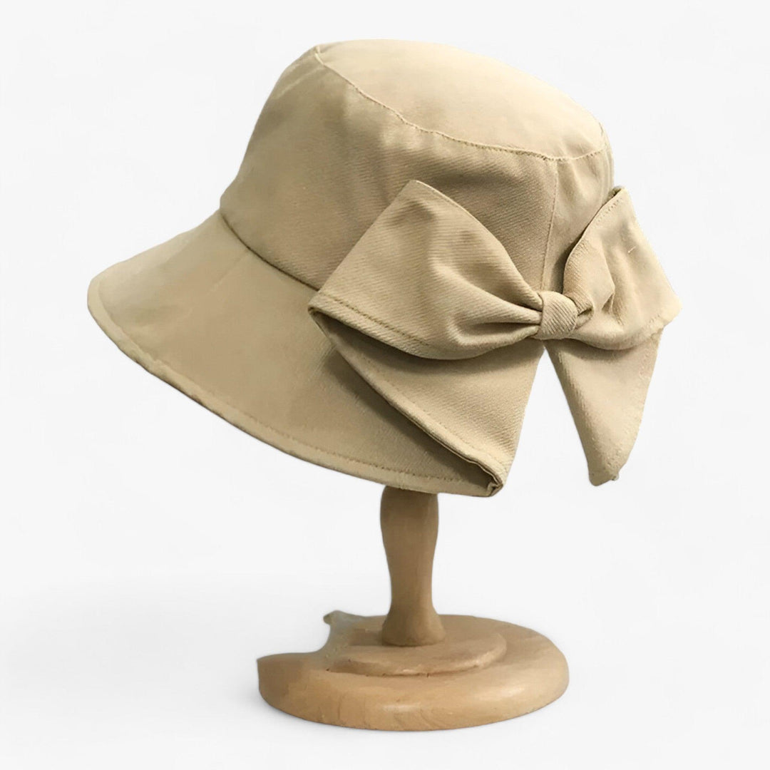 Women's white cotton sun hat, breathable bucket style. Ideal for outdoor adventures, summer, beach, travel & casual wear.