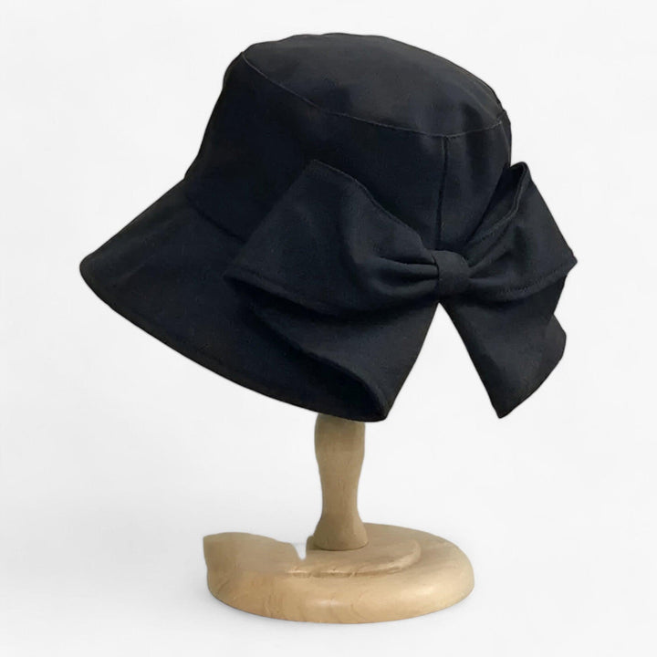 Breathable white cotton sun hat for women, a must-have summer accessory. Perfect for beach trips, hiking & travel.