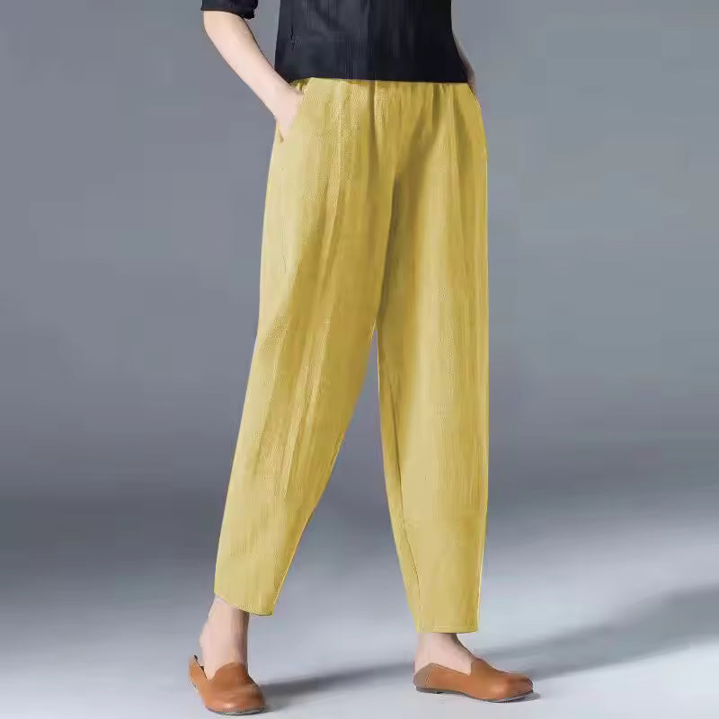 Relaxed fit women's leisurewear trousers with an elastic waist, offering comfort for summer activities.