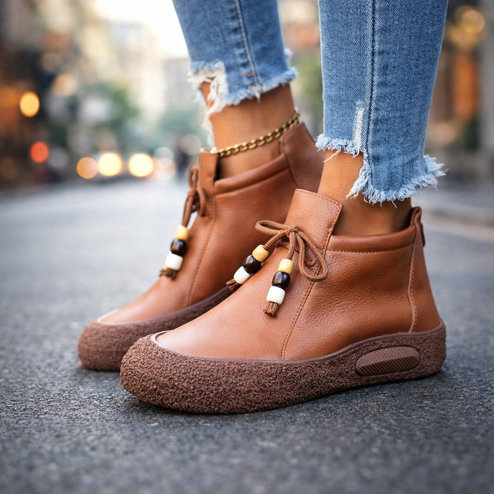 Women's brown leather ankle boots, casual, comfortable, orthopedic, shock-absorbing design for fall fashion.