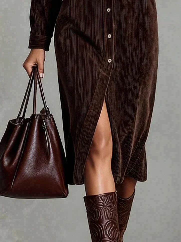 Fashionable women's long sleeve midi shirt dress, button-down front & dual pockets, a versatile staple.