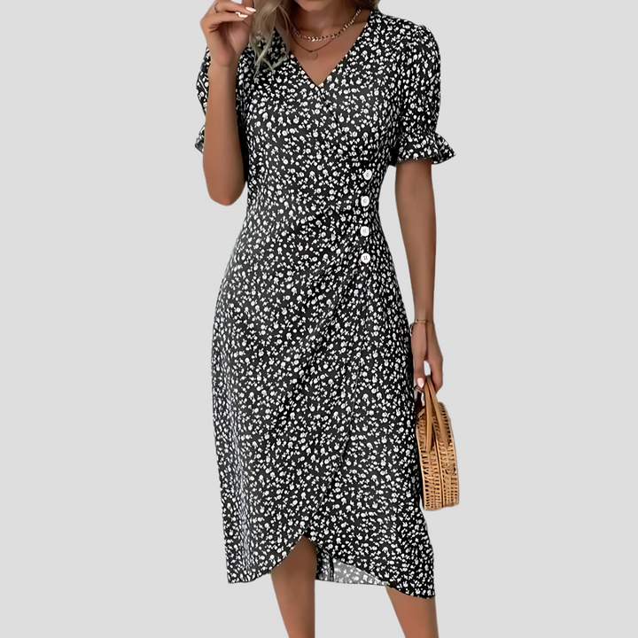 Elegant women's floral midi dress, button front, ideal for summer vacations and spring fashion.