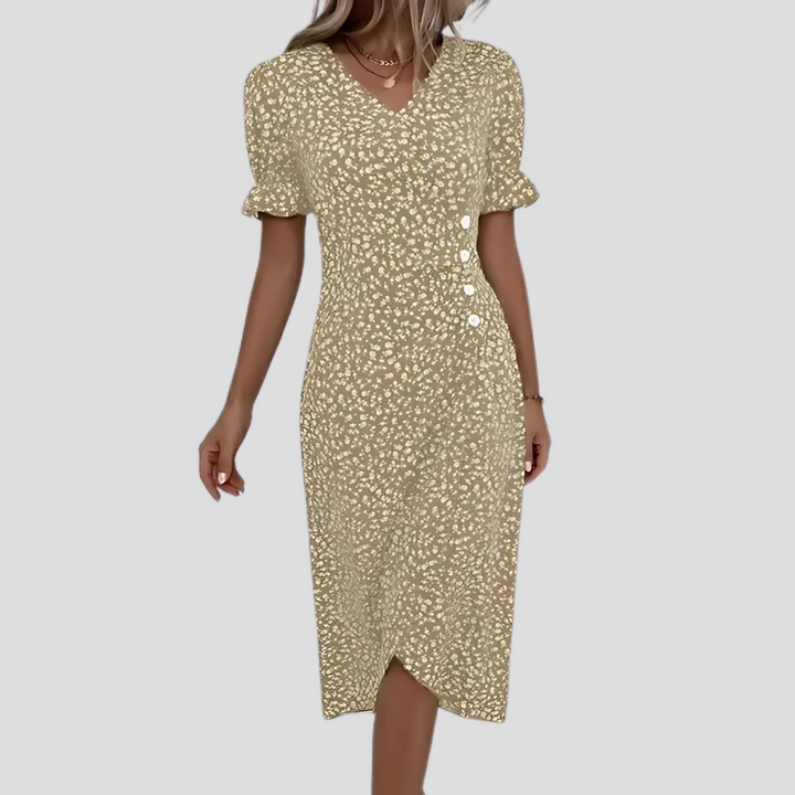 New women's button front floral midi dress, a trendy spring fashion piece with puff sleeves.