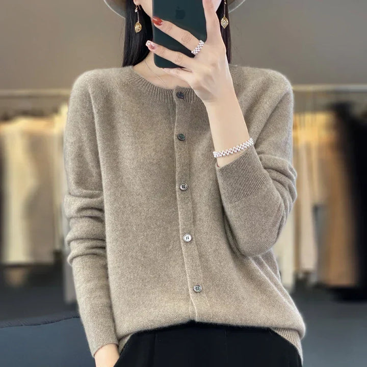 Essential women's cozy knit cardigan. Stylish button front, long sleeve sweater for effortless layering.