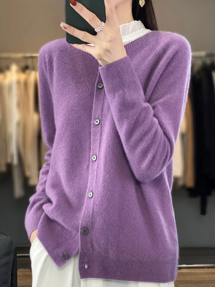 Soft women's knit cardigan. Cozy button front long sleeve sweater, ideal for casual chic looks.