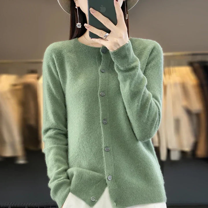 Stylish layering women's button front knit cardigan. Round neck, long sleeve, fashion knit sweater.