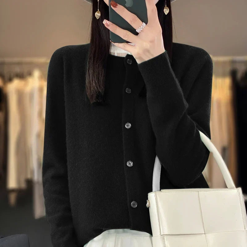 Comfortable women's long sleeve knit cardigan. Button front, round neck, a cozy and stylish layering piece.