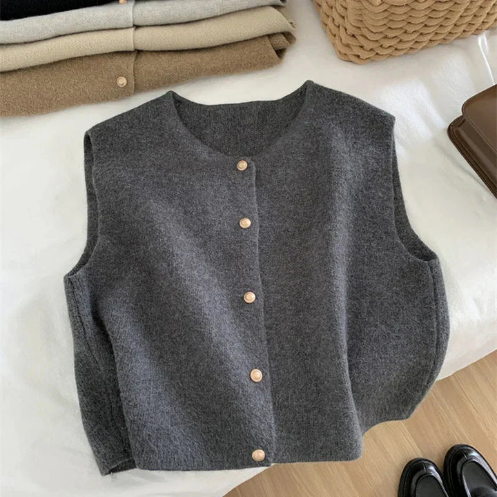 Women's button-up sleeveless casual vest in a light fabric, perfect for layering and comfortable wear.