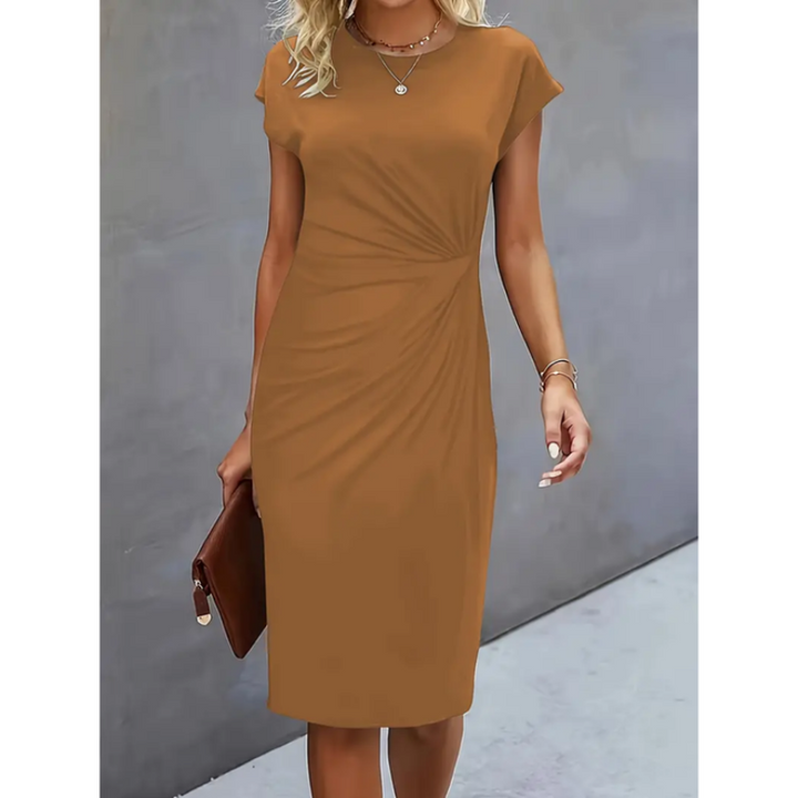 Chic women's cap sleeve midi dress, gathered waist, offering an elegant and modest workwear look.