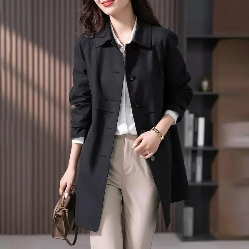 Lightweight women's spring trench coat in a casual style with prominent button-front details