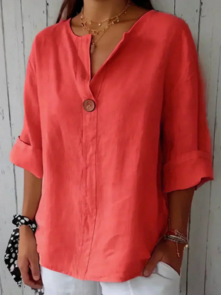 V-neck casual button-front women's tunic blouse with 3/4 sleeves, loose fit summer top, effortless style for women.