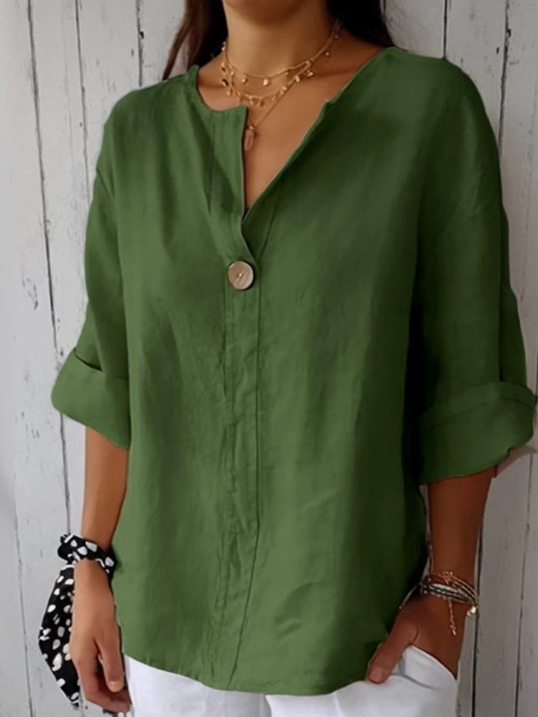 Casual women's V-neck tunic blouse, 3/4 sleeve & button front. Loose fit summer top, great for vacation & relaxed style.