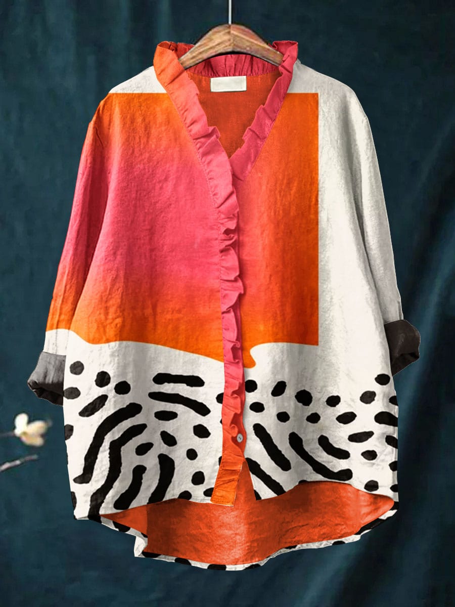 Women's casual button-up blouse with abstract block pattern, long sleeves & ruffled collar. Perfect for everyday wear.