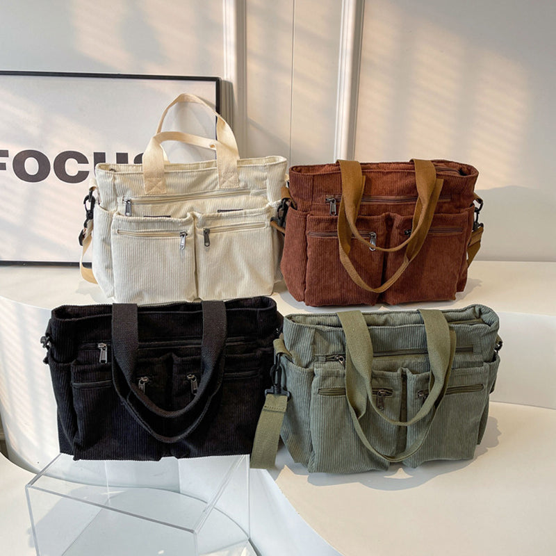 Casual corduroy handbag for women, shown with a comfortable shoulder strap, ideal for daily commutes.