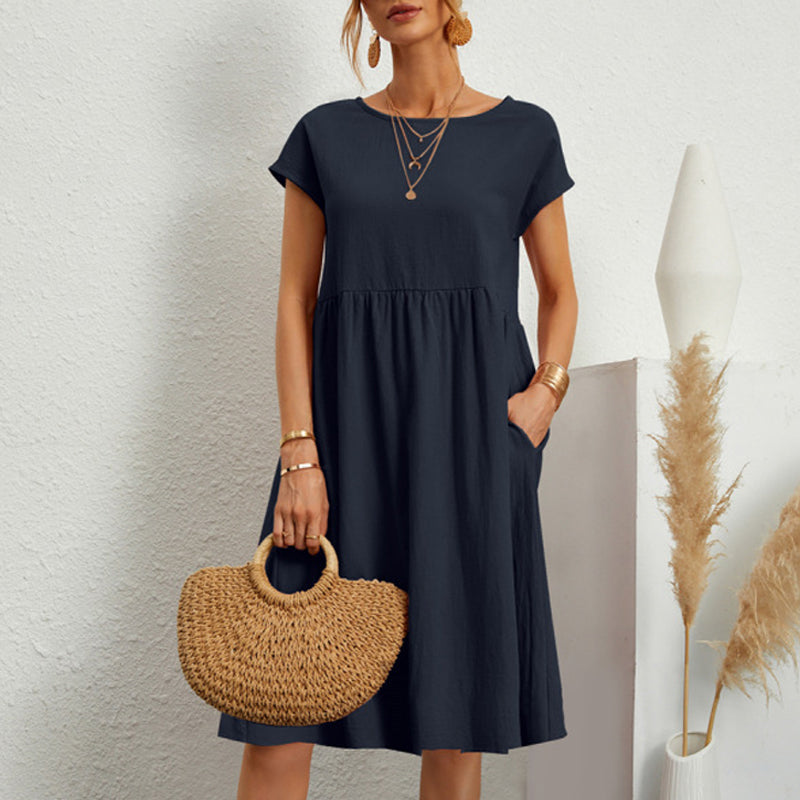 Breathable cotton midi dress for women, round neck, a staple for versatile casual styling.
