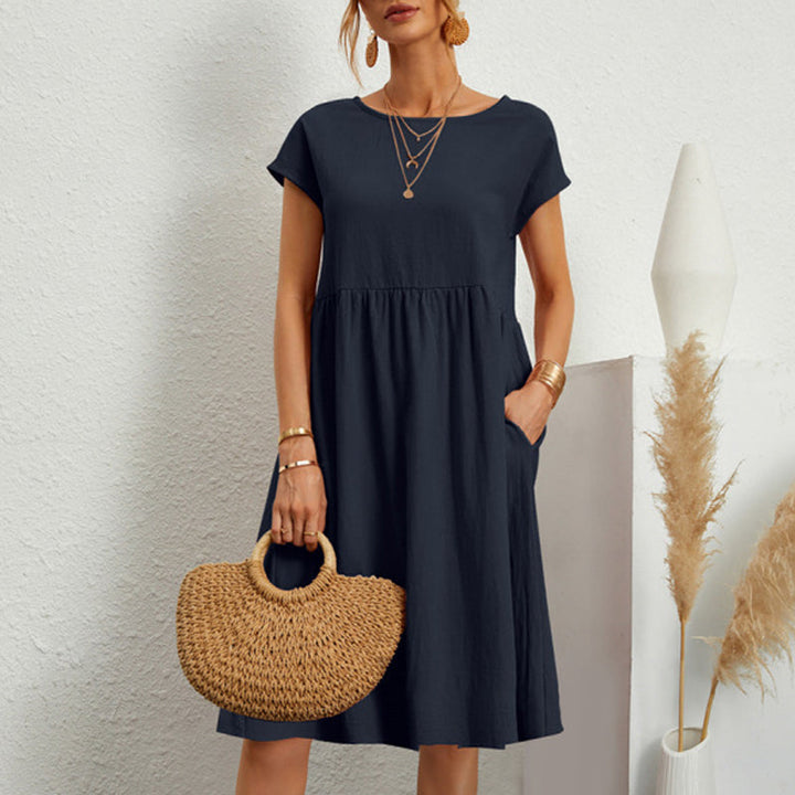 Breathable cotton midi dress for women, round neck, a staple for versatile casual styling.