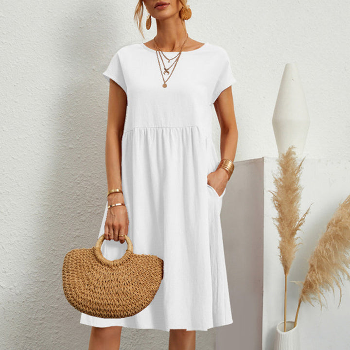 Monochrome cotton midi dress, versatile and comfy, with a classic round neck for women.