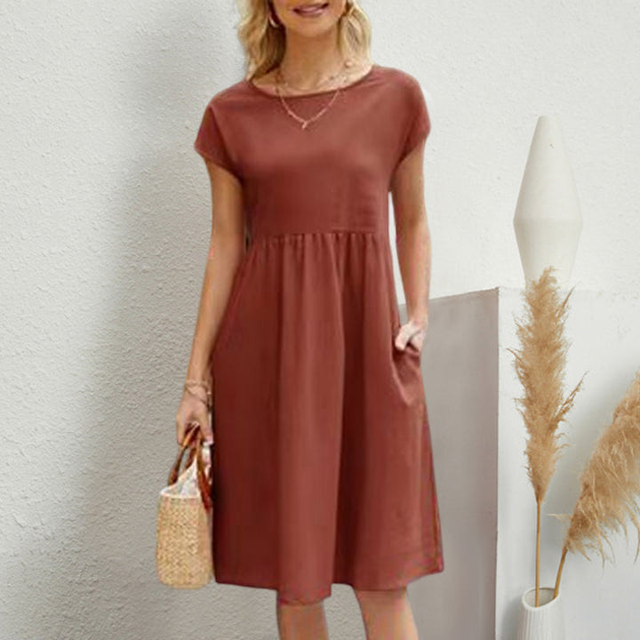 Women's casual round neck midi dress made from soft cotton, an essential for summer comfort.