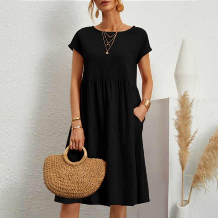 Everyday women's cotton midi dress with a round neck, simple and chic for casual wear.