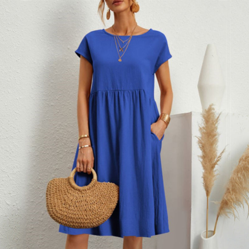 Soft cotton women's midi dress, round neck design, perfect for warm weather casual style.