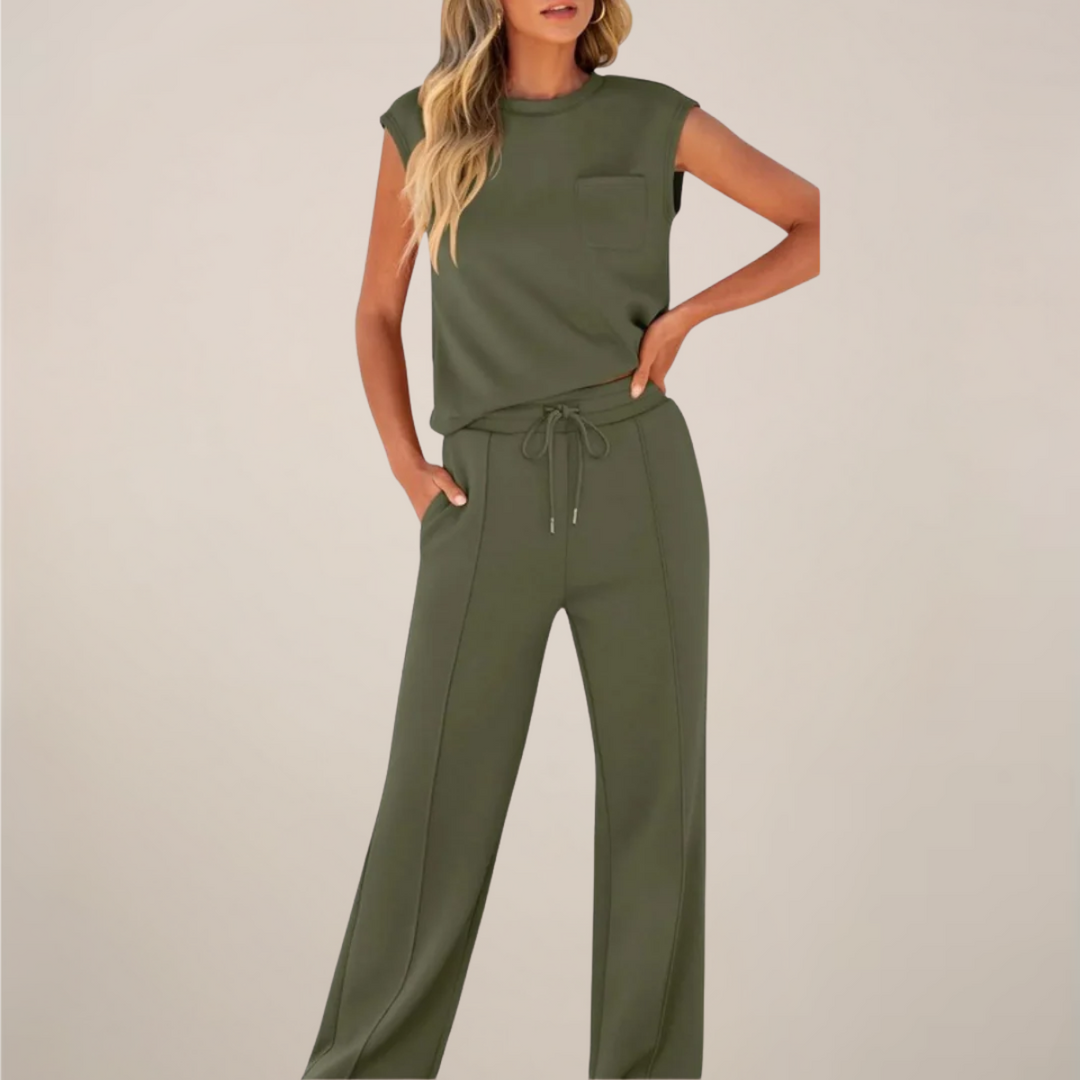 Relaxed fit women's two-piece set with long-sleeve top and adjustable drawstring pants.