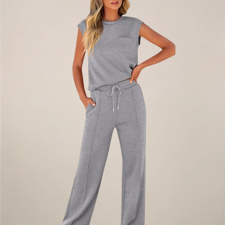 Stylish women's casual wear, a comfy two-piece drawstring pants and top ensemble.
