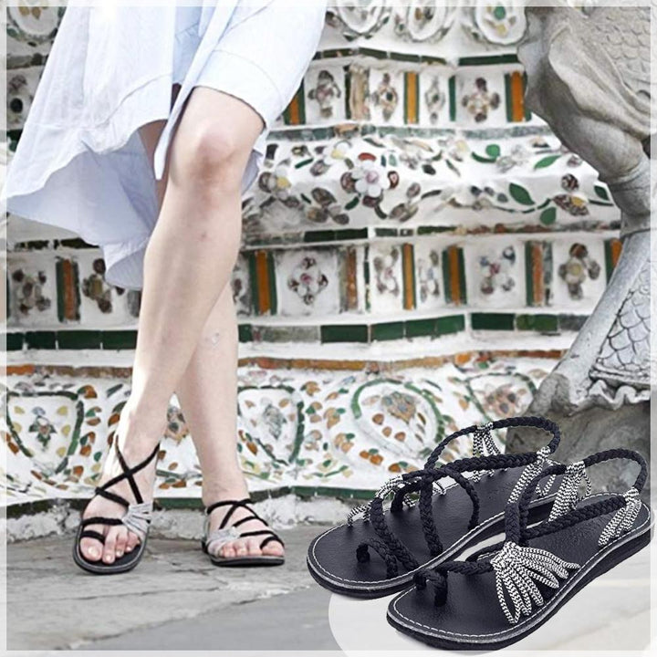 Hand-woven palm leaf flat sandals for women, offering a comfortable and stylish summer footwear option.