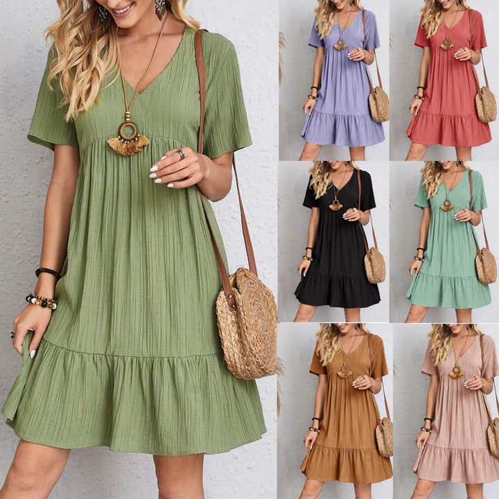 Women's casual flowy A-line mini dress in a vibrant summer color, perfect for warm weather comfort.
