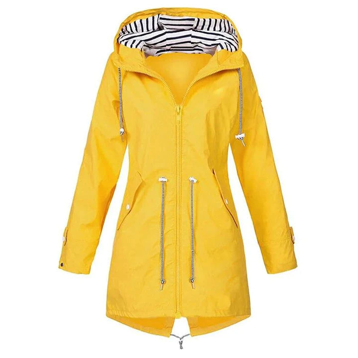 Detailed shot of the zipper and pockets on a women's water-resistant hooded jacket, practical for spring.