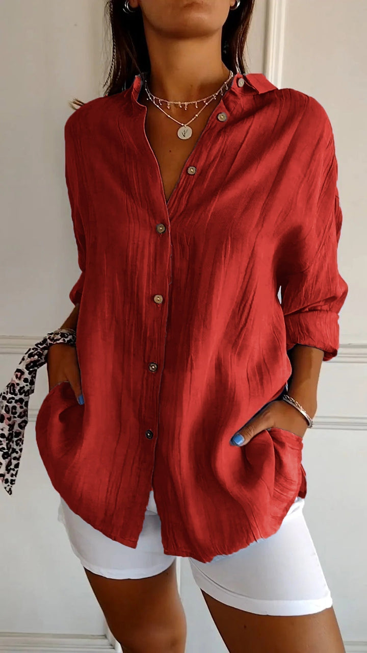 Casual long sleeve women's blouse, featuring a comfortable relaxed fit and classic button-down style.
