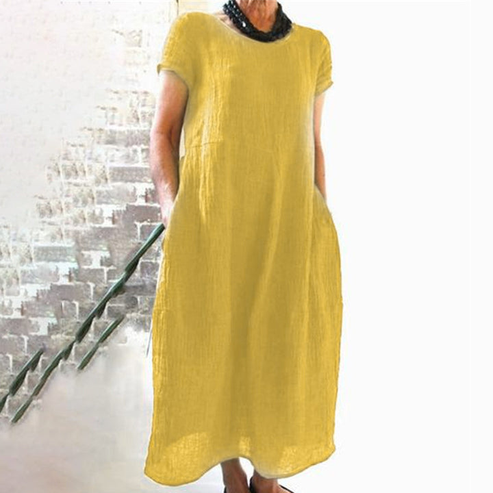 Soft cotton women's casual dress, solid color, ideal for relaxed spring and summer wear.