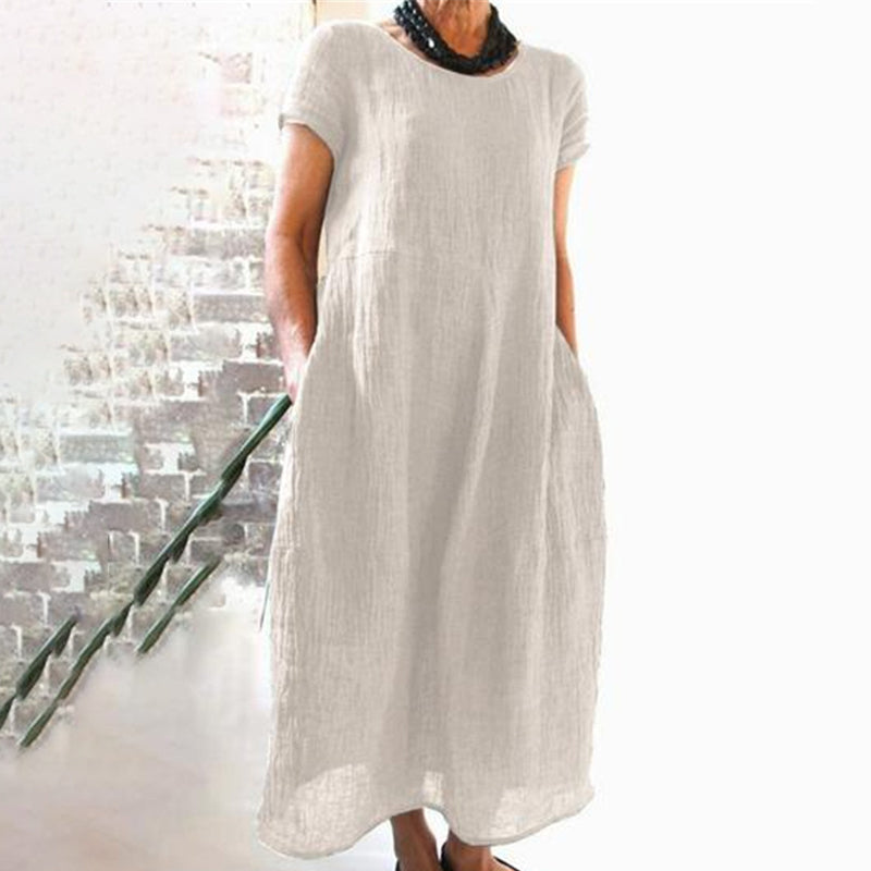 Loose fit women's T-shirt dress, solid color for casual outings and everyday comfort.